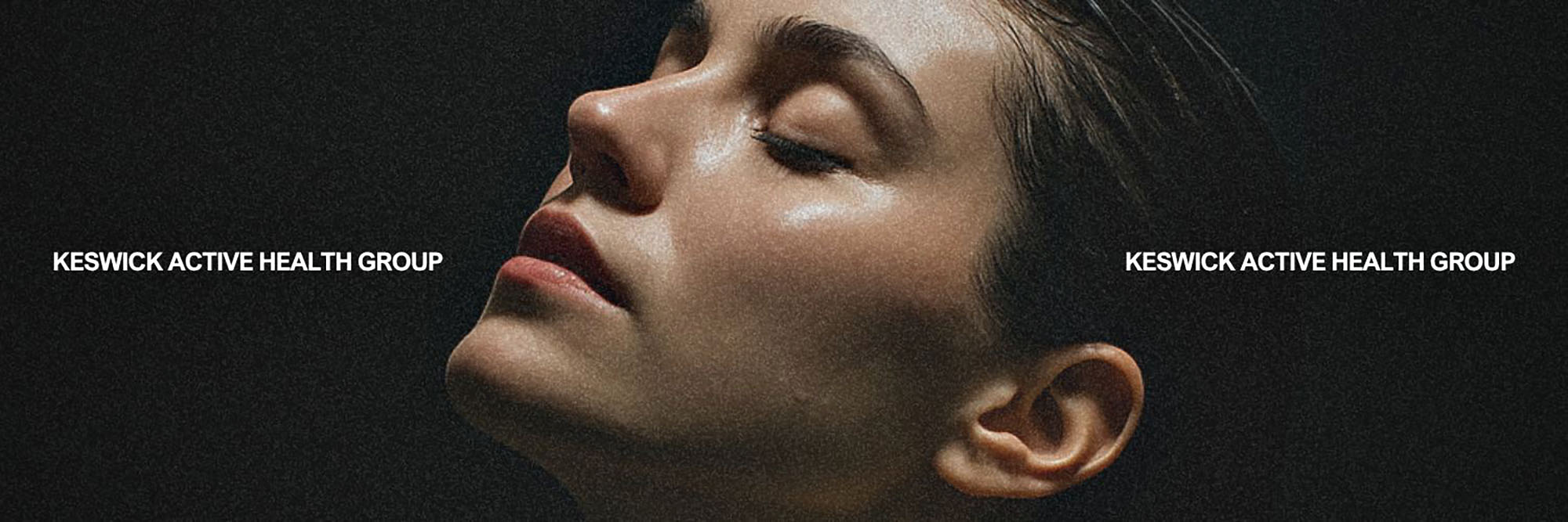 Relaxed woman with closed eyes in serene wellness setting